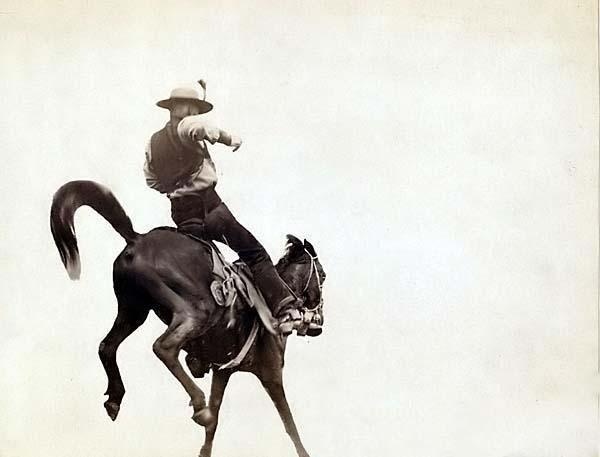 Фото John C. H., "Bucking Bronco." Ned Coy, a famous Dakota cowboy, 1888 г. © Old Picture [www.old-picture.com] (http://www.old-picture.com/old-west/Bucking-Bronco.htm)  