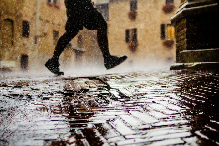 Running in Rain © Jordan Rathkopf